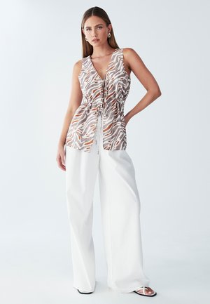 LEVIE  - Bluza - tan zebra print