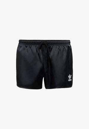 Shorts de bain en satin noir avec une taille élastique et un cordon de serrage. Présente un logo Adidas blanc sur le bas du côté droit.