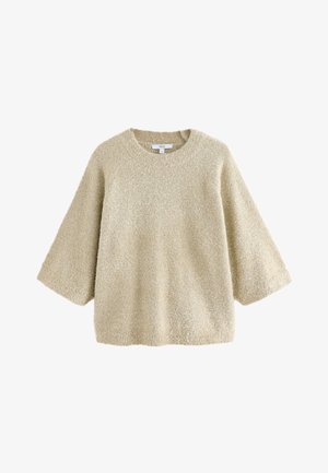 Beige, fluffig stickad tröja med rund halsringning och vida ärmar. Mjuk textur med lös passform, lämplig för lager-på-lager.