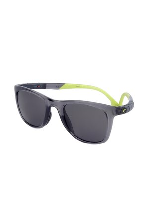 Occhiali da sole avvolgenti neri con lenti scure e aste giallo neon, con un piccolo logo sulla stanghetta.