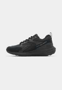 Black athletic sneakers featuring a mix of materials, textured accents, a cushioned sole, and branding on the side. Overall streamlined design.