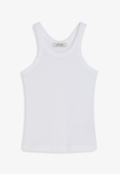Top bianco senza maniche realizzato in tessuto liscio, con scollatura rotonda e spalline larghe, con un'etichetta interna che riporta la scritta "IVY OAK."