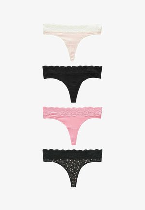 Quattro paia di infradito: bianche a righe con pizzo, nere uniformi, rosa con pizzo e nere con pizzo e motivo a cuore. Tessuto morbido, texture varie.