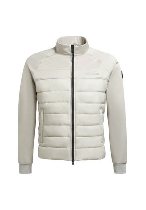 Lichtbeige jack met een ritssluiting aan de voorkant, gewatteerd lichaam en gladde mouwen. Voorzien van een opstaande kraag en logo-decoratie op de borst.
