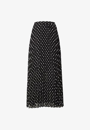 Schwarzer Maxi-Rock mit weißen Punkten. Verfügt über einen breiten Bund und ein fließendes, leichtes Material. Vertikale Linien, die durch die Falten entstehen.