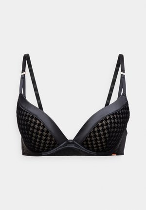 Soutien-gorge noir avec un design à décolleté plongeant rembourré, présentant des panneaux en mesh à motif pied-de-poule et des bretelles en satin, rehaussé d'un petit détail métallique.
