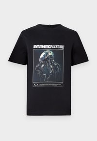 Black T-shirt with a graphic of a mechanical jellyfish and the text "SYNTHETIC NATURE" above it.