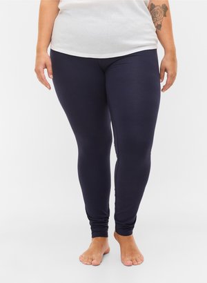 Navyblaue Leggings aus dehnbarem Material, mit einer glatten Textur und eng anliegender Passform, die an den Knöcheln enden und ein schlichtes Design aufweisen.