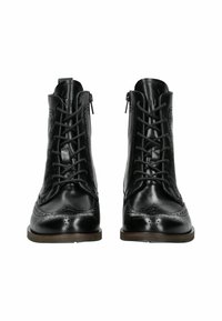 Gli stivaletti neri in pelle presentano un design a punta d'ala, dettagli brogue, lacci frontali e zip laterali. Texture liscia e forma della punta arrotondata.