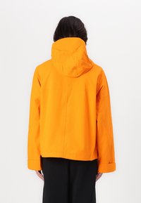 LOW LIGHTS STUDIOS® ORION TECH JACKET UNISEX - Lett jakke - orange