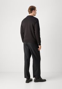 Calvin Klein Jeans MONOLOGO CREW NECK - Felpa - black