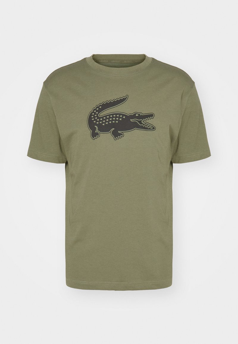 Olijfgroene katoenen T-shirt met een ronde hals en korte mouwen, voorzien van een zwart krokodillenafbeelding op de voorkant.