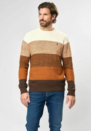 Knitted sweater with horizontal stripes in cream, light brown, orange, and dark brown. Features ribbed cuffs and hem, with a small logo on chest.