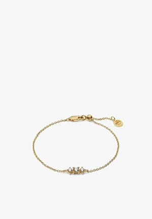 Guld kædearmbånd med tre klare ædelsten sat i sølvfarvede prongs, med en sikker lås og en cirkulær logo charme.