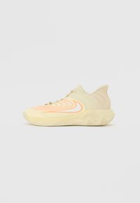 Light beige athletic shoe with wavy orange accents, textured upper material, and a chunky sole design. Distinguished by a modern silhouette.