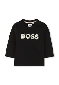 Fekete, hosszú ujjú pamut póló, nagy fehér, textur�ált "BOSS" logóval. Két patentgomb a gallérnál az egyszerű öltözködés érdekében.