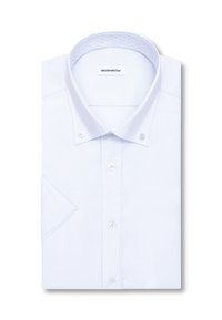 Chemise blanche à manches courtes, boutonnée et soigneusement pliée, avec un col boutonné et une étiquette de marque visible à l'intérieur du col.