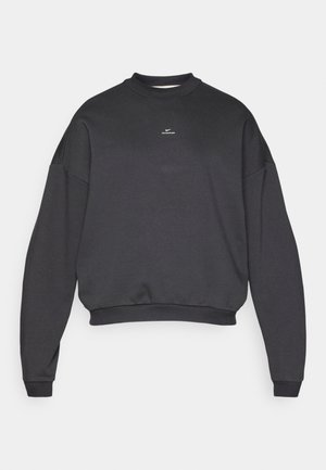 Black cropped sweatshirt featuring a crew neckline, drop shoulder design, and a small white logo on the chest. Made from soft fabric.