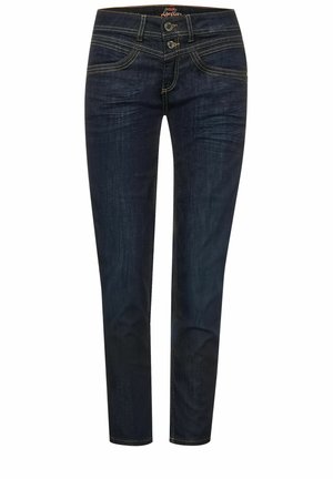 Mørkeblå slim fit jeans med dobbelt knaplukning, forlommer og kontrastsyninger, vist mod en hvid baggrund.