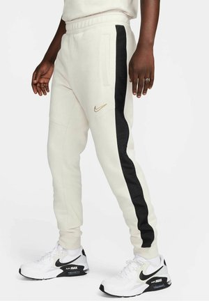 Pantalones deportivos - beige