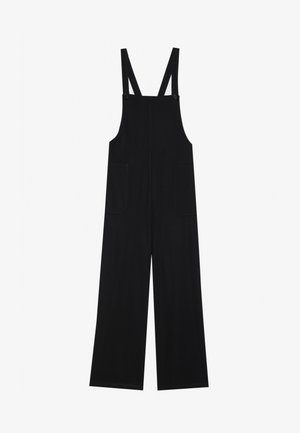 Mustad mustad, pehmest kangast, laia säärega, kahe esi-taskuga ja reguleeritavate õlapaeltega, millel on nuppudega kinnitused.