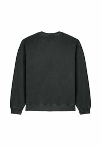 Felpa nera con collo tondo, maniche lunghe e polsini a coste. Tessuto morbido con un aspetto sbiadito e leggermente consumato, caratterizzata da orlo dritto.