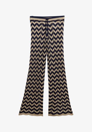 Gebreide broek met een zigzagpatroon in marineblauw en beige. Heeft een koord in de taille en uitlopende benen voor een relaxte pasvorm.