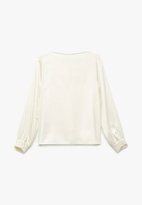 Langærmet, cremefarvet bluse i glat stof. Har en rund halsudskæring og knapmanchetter. Glat tekstur med minimalt design.
