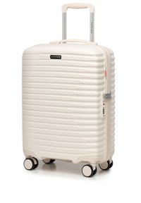 Walizka Wittchen hardshell w kremowym kolorze z żebrowaną fakturą, srebrną rączką i czterema czarnymi kółkami. Posiada zamek błyskawiczny oraz zamek szyfrowy.