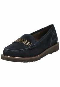 Zapato de ante azul marino tipo slip-on con una tira decorativa de tachuelas doradas en el empeine y una suela gruesa marrón. Presenta detalles de costura.