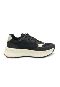 Schwarzer Sportschuh mit Mesh-Obermaterial, cremefarbener Zwischensohle und strukturiertem Gummi-Außensohle. Verfügt über ein geschwungenes Design und tonale Akzente.