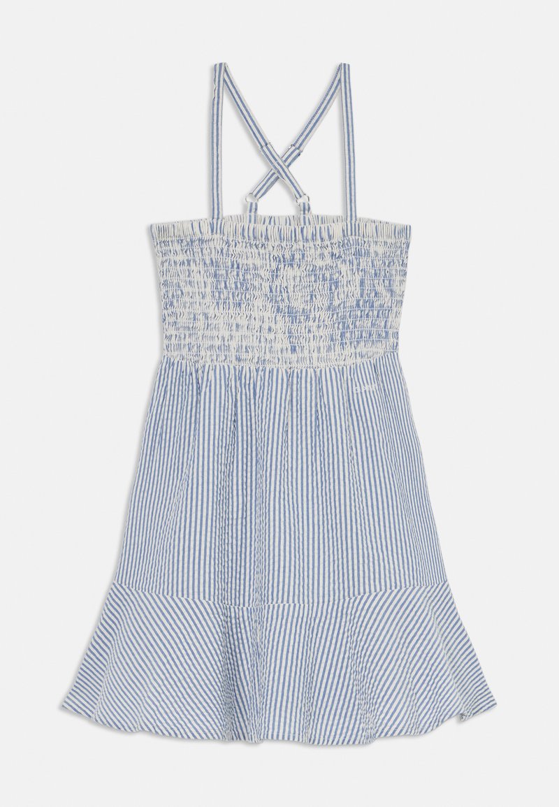 Juostuota suknelė su smulkiu audiniu, reguliuojamomis petnešomis, įstrižainės dizaino ir platėjančiu kraštu, mėlynos ir baltos spalvų.