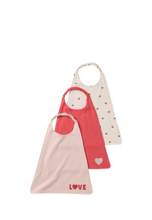 Three soft fabric bibs in pink, red, and white with heart patterns and elastic neckbands, designed for babies or toddlers.