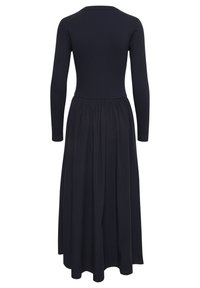 Long-sleeve dress with a ribbed top and flowing, gathered skirt. Made of dark blue fabric, features a round neckline and fitted bodice.