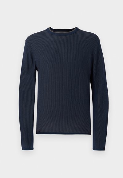 Geribbelde marineblauwe trui met lange mouwen, ronde hals en subtiele textuur. Voorzien van een contrasterende afwerking van de binnenkraag.