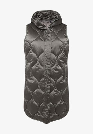 Vaatetus ilmanhihoilla ja hupulla, valmistettu kiiltävästä tummanharmaasta kankaasta. Siinä on tikattu kuvio ja sivutaskut. Helma on hieman pyöristetty.