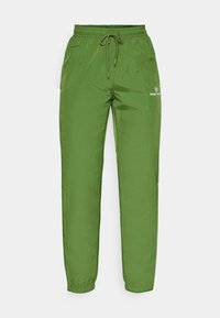 NAYLA PANTS - Tracksuit bottoms - garden green/gardenia