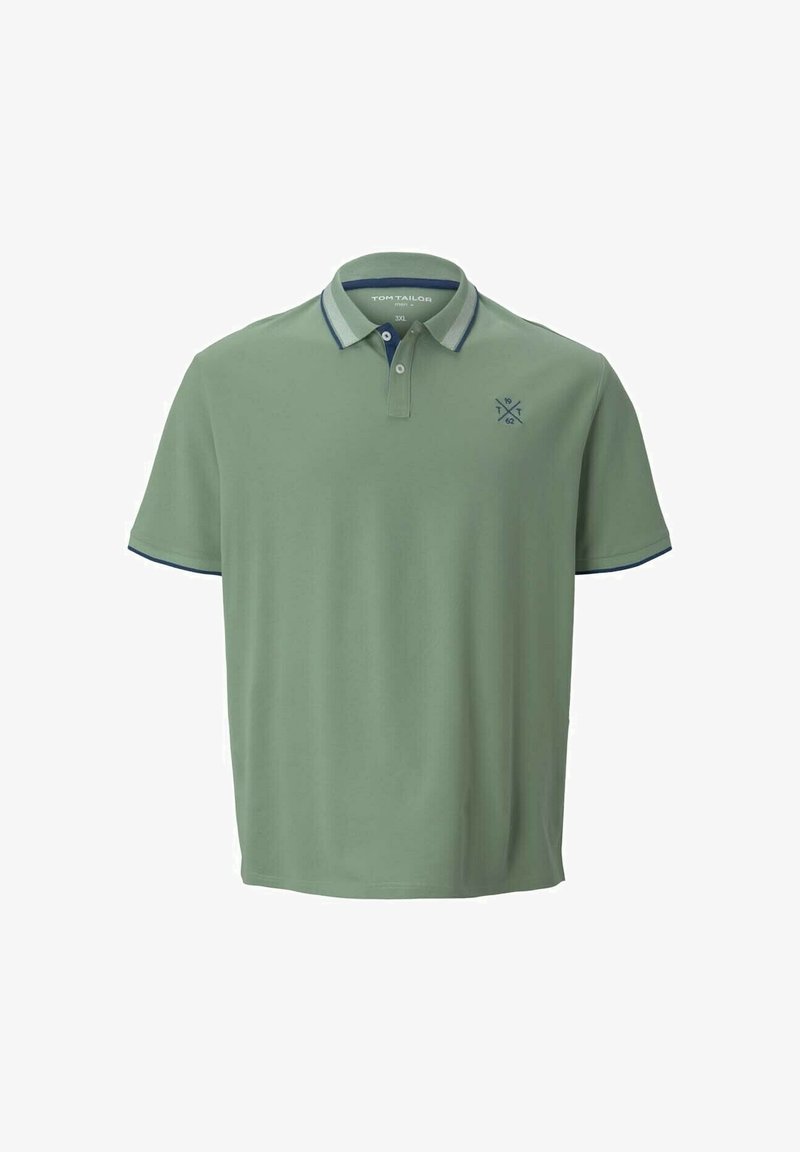 Polo en vert pâle fait d'un tissu doux. Présente un col et des poignets bleus, avec un petit logo sur la poitrine gauche.