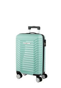 Maleta rígida de color verde menta con textura ondulada acanalada, asa retráctil y cuatro ruedas multidireccionales. Cuenta con un logotipo plateado.