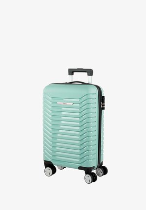 Maleta rígida de color verde menta con textura ondulada acanalada, asa retráctil y cuatro ruedas multidireccionales. Cuenta con un logotipo plateado.