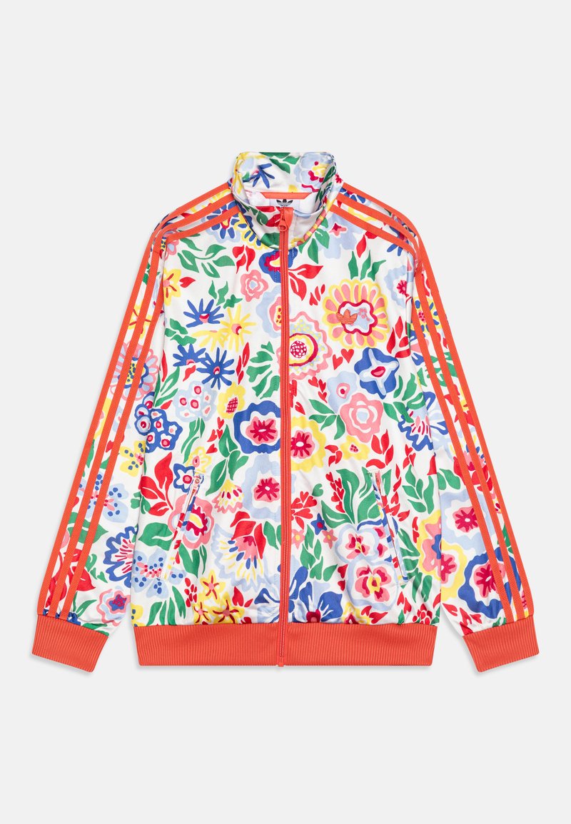 Floral track jacket with a white base, featuring vibrant red, blue, and yellow flowers. Red striped accents along sleeves and a zip front.
