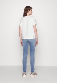 Calvin Klein MICRO biały