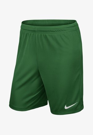 Shorts de sport verts en tissu lisse et léger. Dotés d'une ceinture élastique et d'un logo Nike swoosh blanc sur le bas du côté droit.