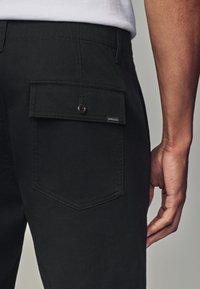Next REGULAR FIT - UTILITY STYLE - Housut - black