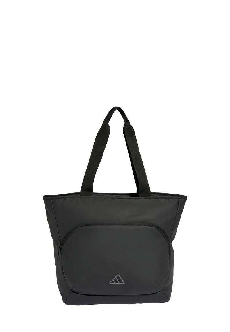 Svart nylon tote-väska med två robusta handtag, en framficka med dragkedja och en subtil logotyp. Designen är enkel och funktionell.