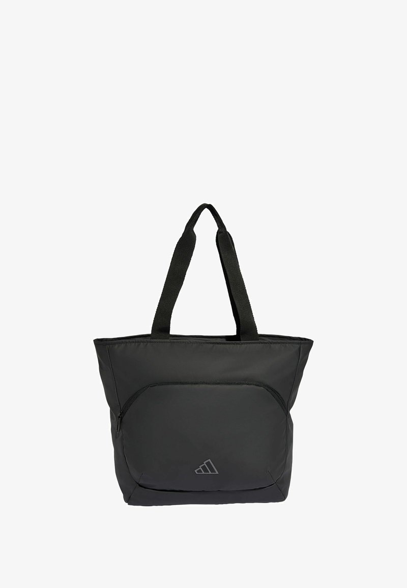 Black nylon tote bag with two sturdy straps, a front zip pocket, and a subtle logo. The design is simple and functional.