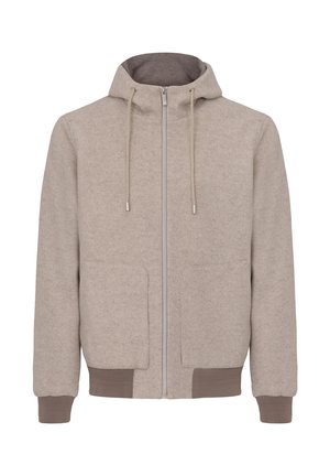 Sudadera cremallera beige hecha de una tela suave, con capucha, dos bolsillos frontales, puños acanalados y una cremallera suave con acentos texturizados.