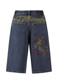 Denim shorts in dark blue with yellow embroidered text "Ed Hardy." Features a detailed tiger and heart design with colorful accents.