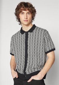 Obey Clothing TESTAMENT BUTTON FRONT POLO UNISEX - Blusa - black multi