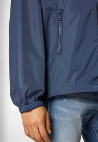 Diesel CLOG - Windbreakers - blue